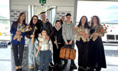 Sezonun ilk dış hat uçuşu çiçeklerle karşılandı